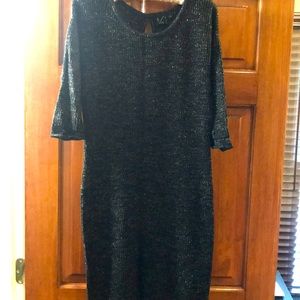Black sweater dress with gold detail